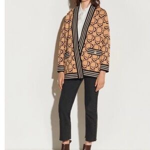 Sandro reversible logo cardigan.